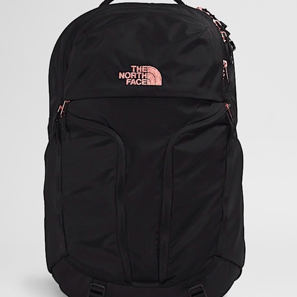 The North Face Black Backpack with Metallic Pink Details